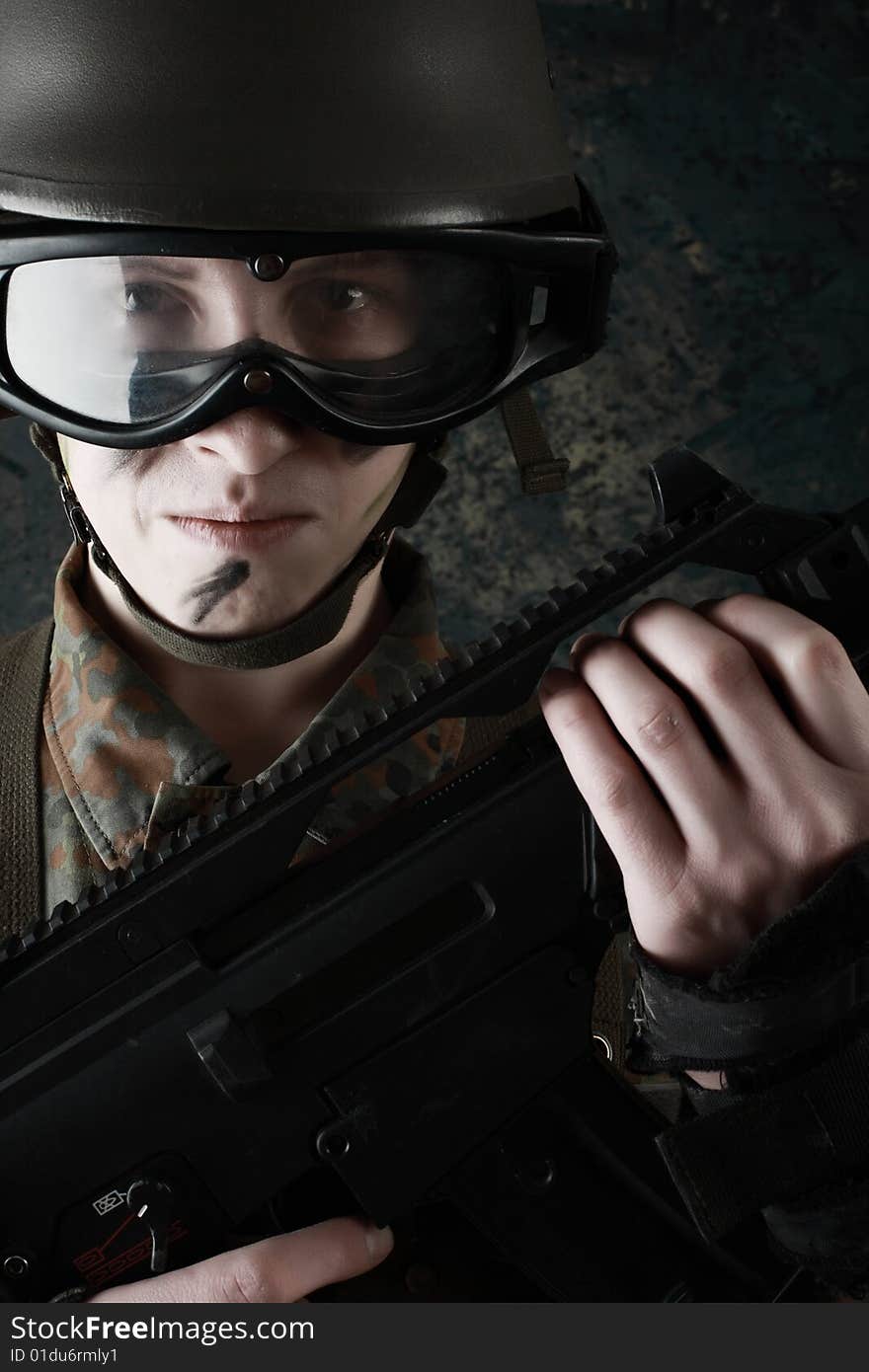 Shot of a soldier holding gun. Shot of a soldier holding gun.