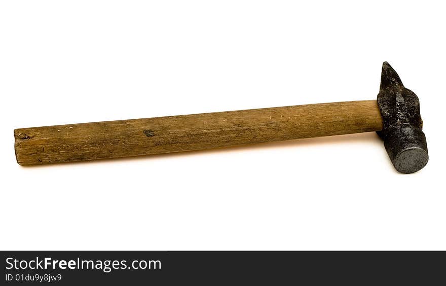 Simple hammer with the wooden handle. It is isolated on a white background with clipping path. Studio light. Simple hammer with the wooden handle. It is isolated on a white background with clipping path. Studio light.