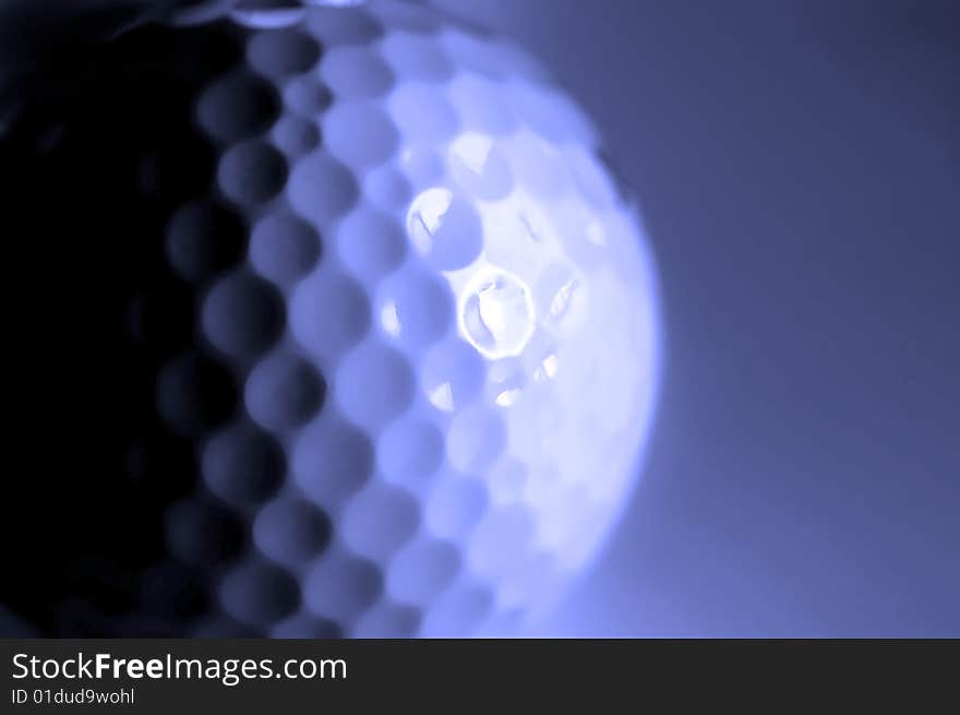 Closeup of golfball with dark shadows. Closeup of golfball with dark shadows