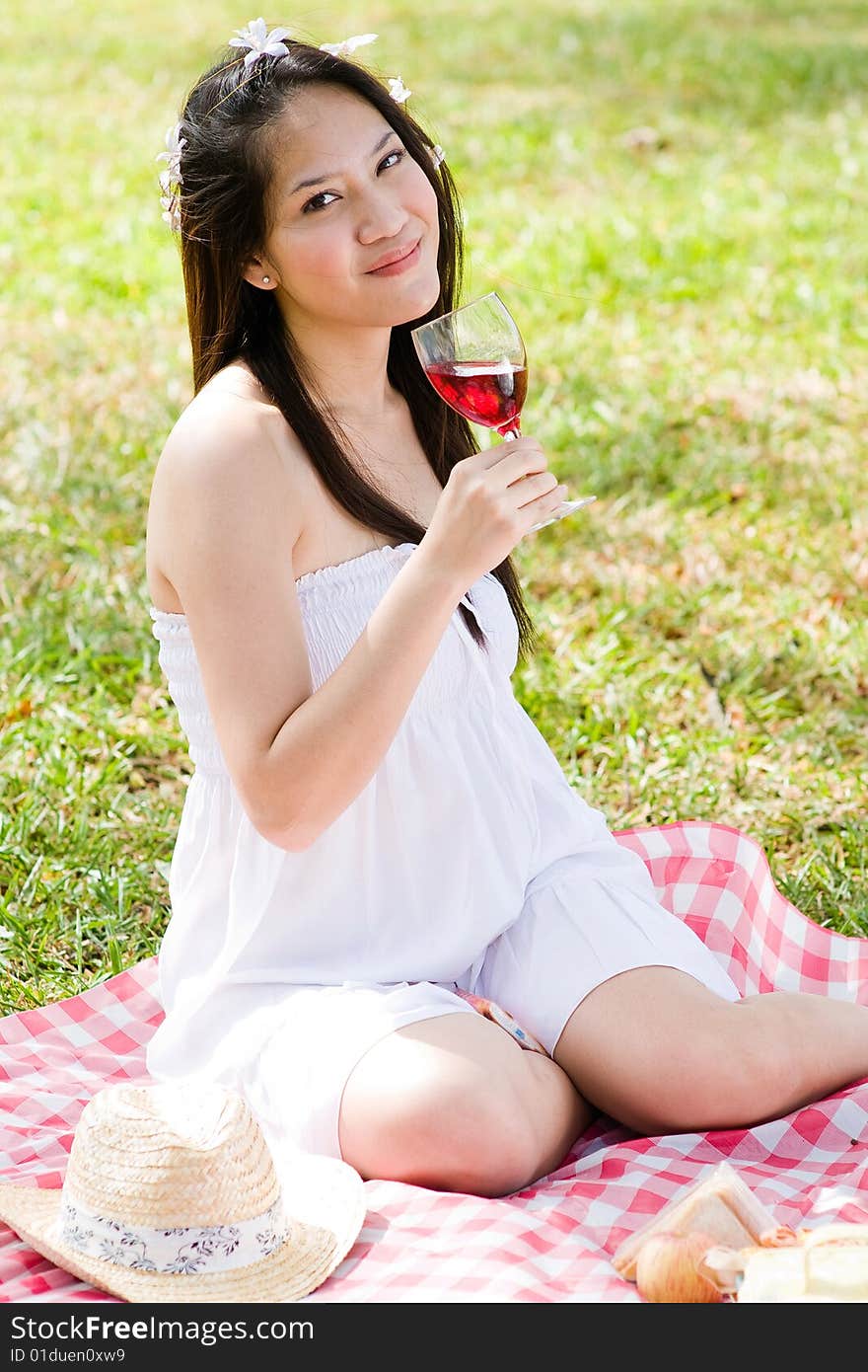 Beautiful asian girl picnic in the park