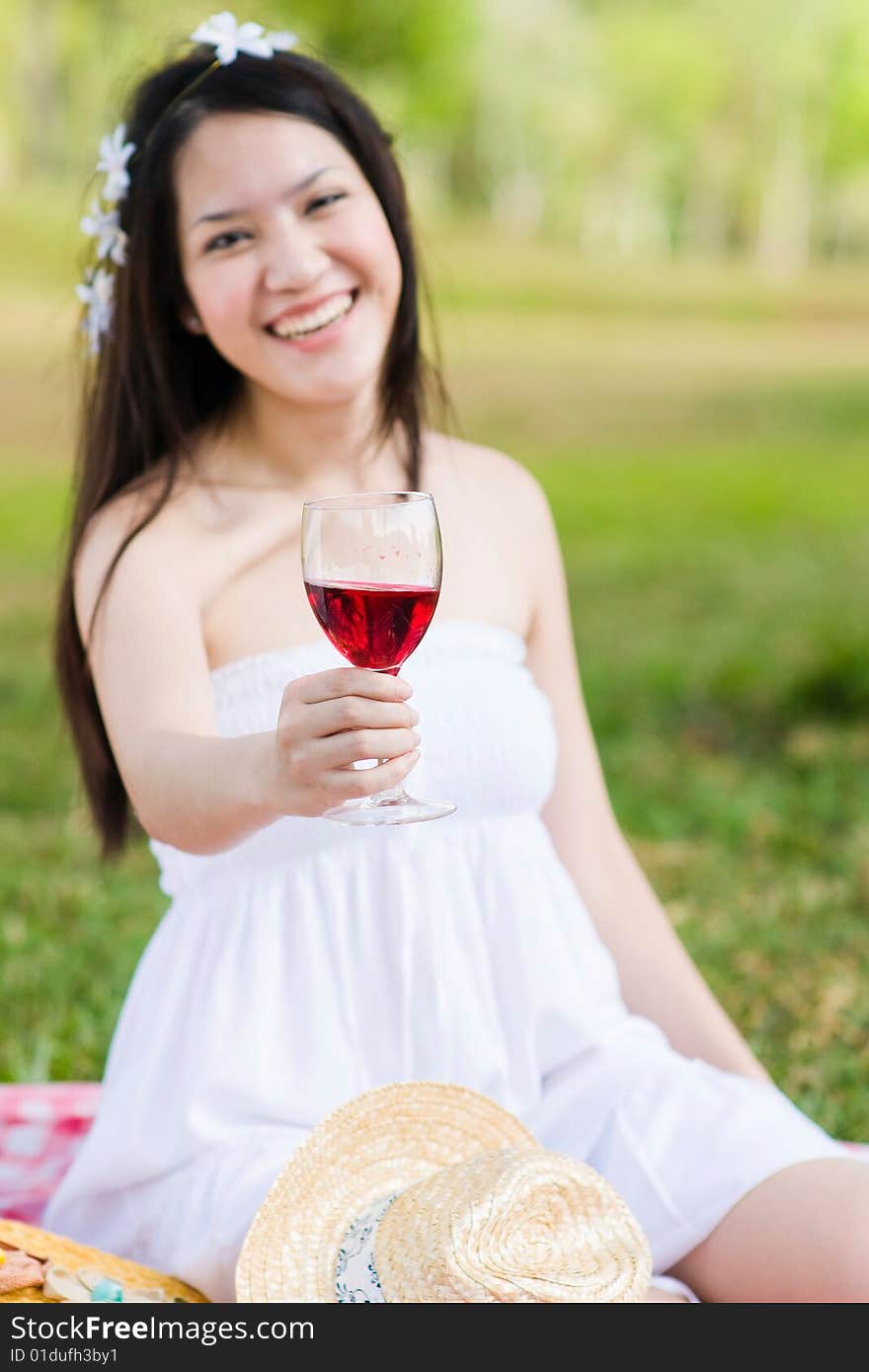 Beautiful asian girl picnic in the park