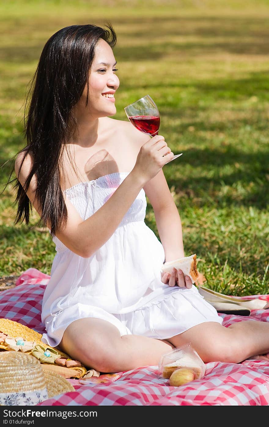 Beautiful asian girl picnic in the park