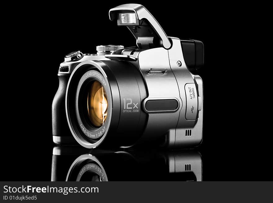 Photo camera isolated on black