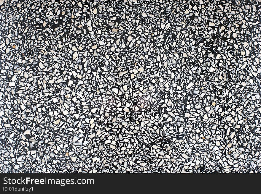 A light granite structure background texture. A light granite structure background texture