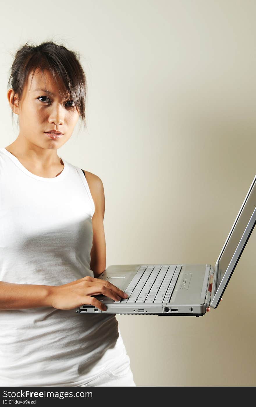 Woman Holding A Laptop