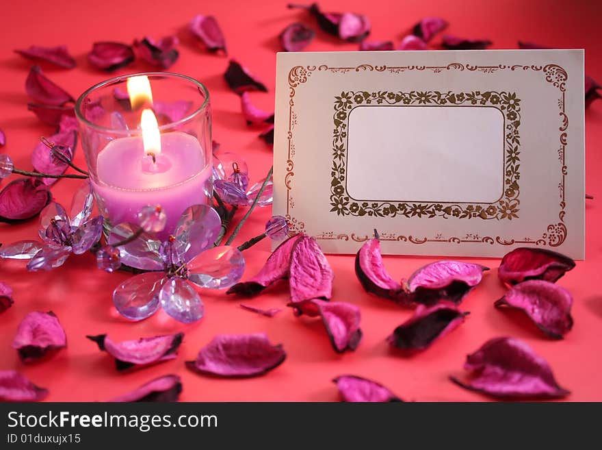 Candle with crystal flower, dry petals and Blank Card. Candle with crystal flower, dry petals and Blank Card