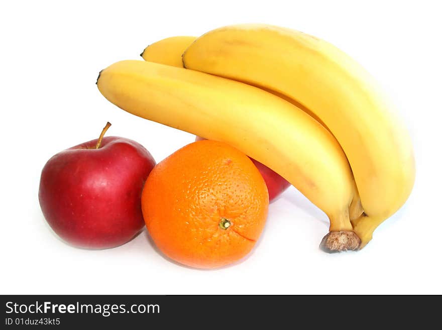 Banana apple and orange isolated against white. Banana apple and orange isolated against white.