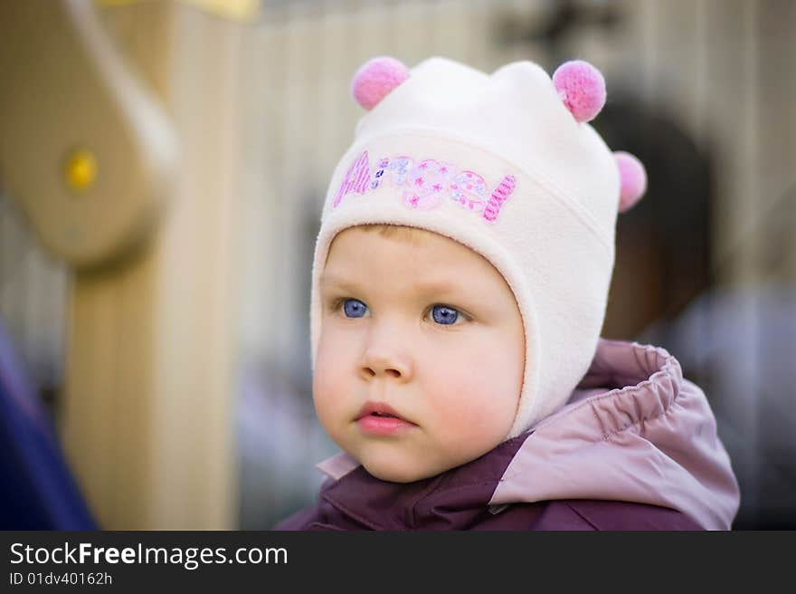 Portrait of the child of 2 years in the street