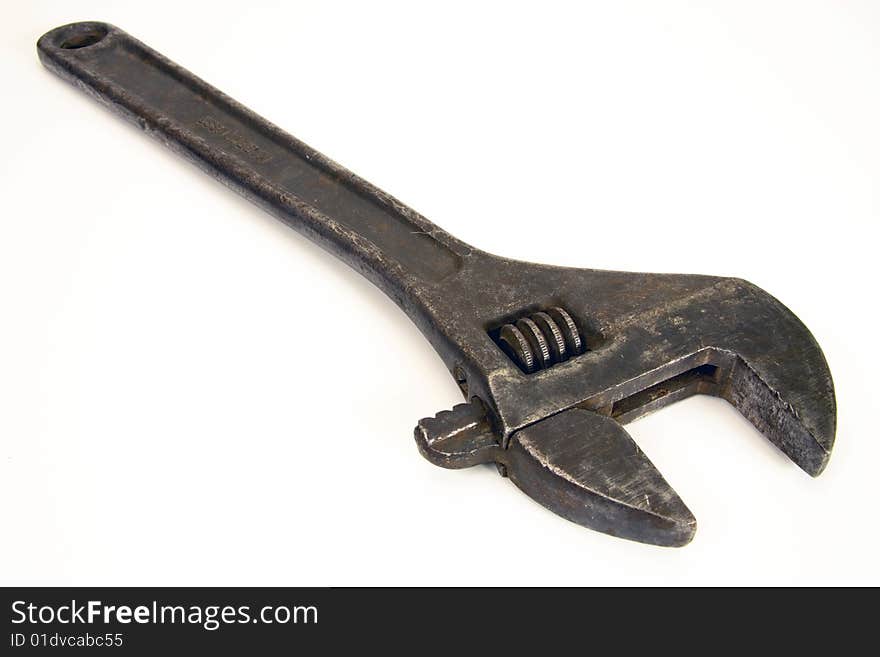 Old spanner on a white background. Old spanner on a white background.