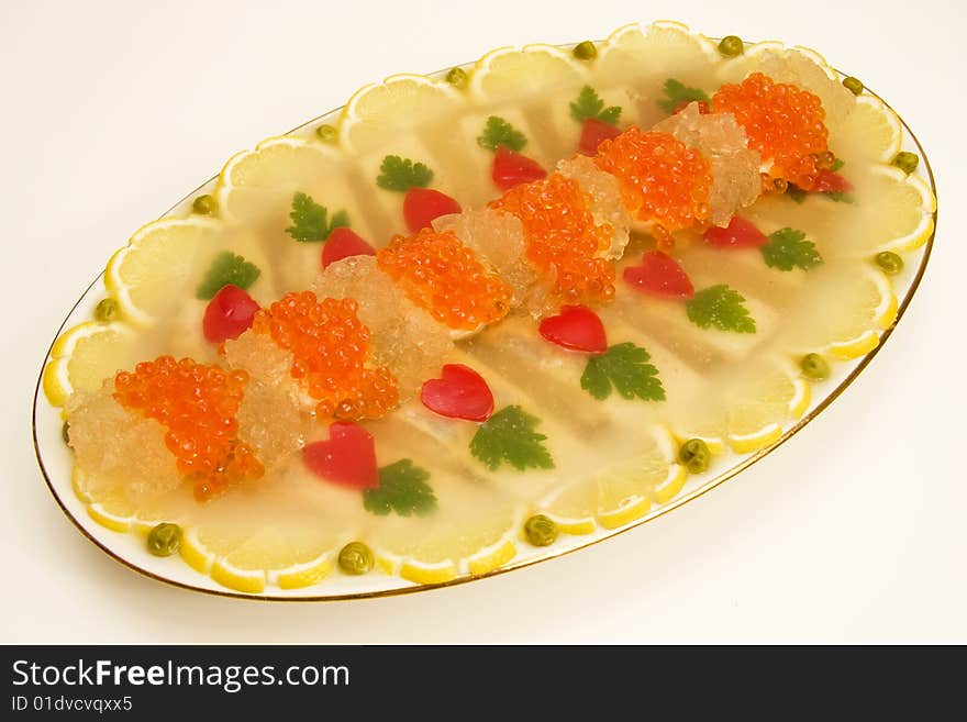 Fish jellied with red caviar.