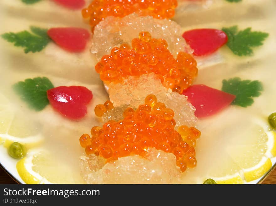 Fish jellied with red caviar. Fish jellied with red caviar.