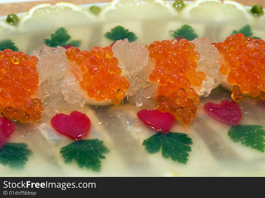 Fish jellied with red caviar. Fish jellied with red caviar.