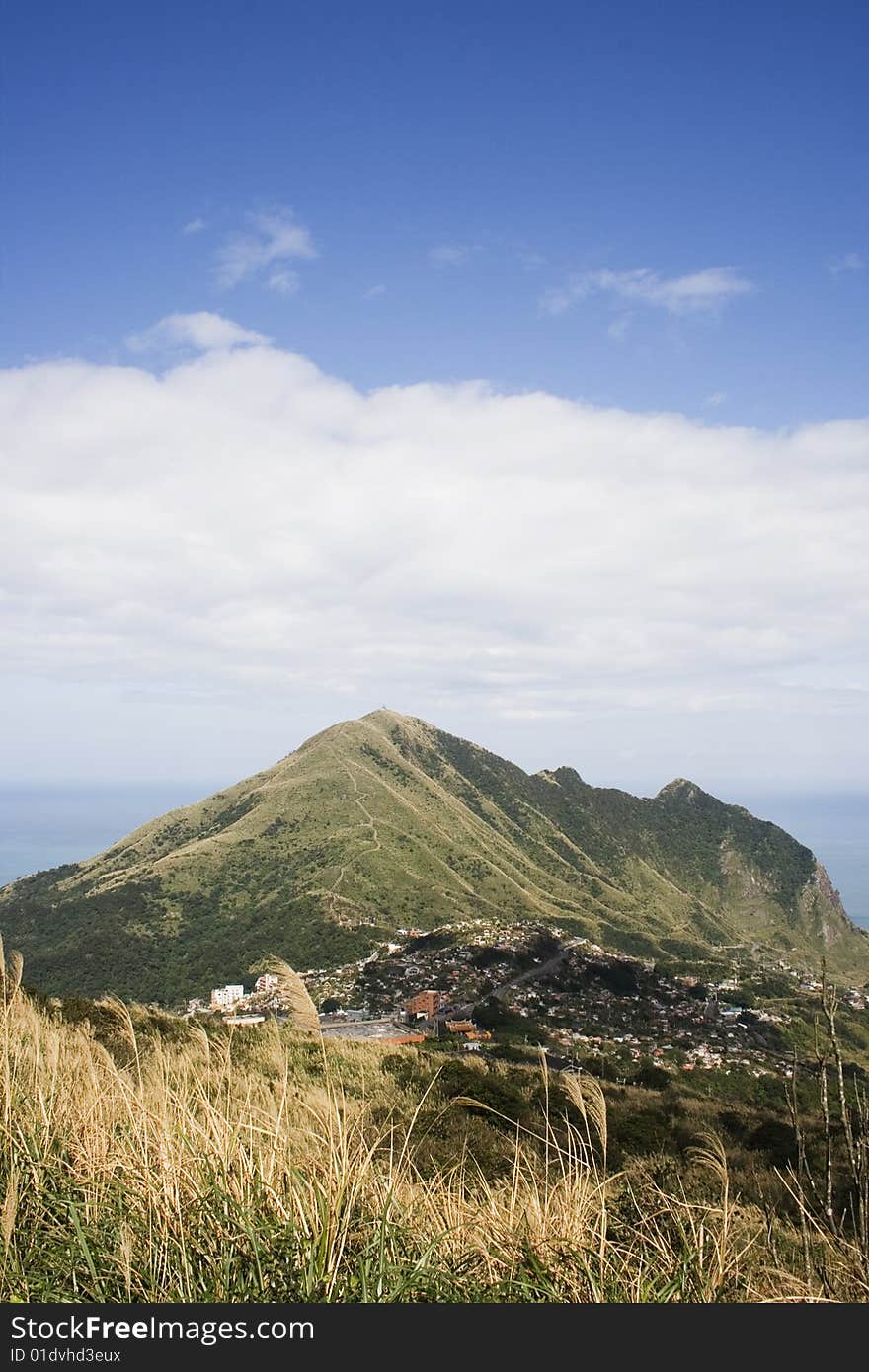 Keelung Mountain and village, on the north east coast of Taiwan.  This area used to be a mining, where gold and coal was mined. The area has spectacular scenery.