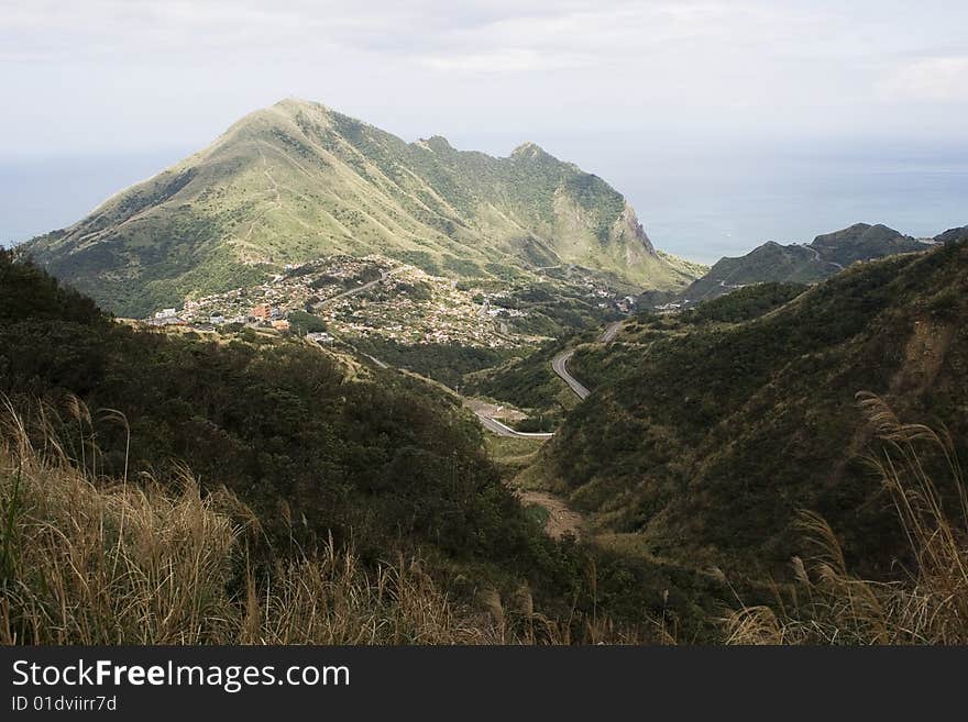 Keelung Mountain and village, on the north east coast of Taiwan.  This area used to be a mining, where gold and coal was mined. The area has spectacular scenery.