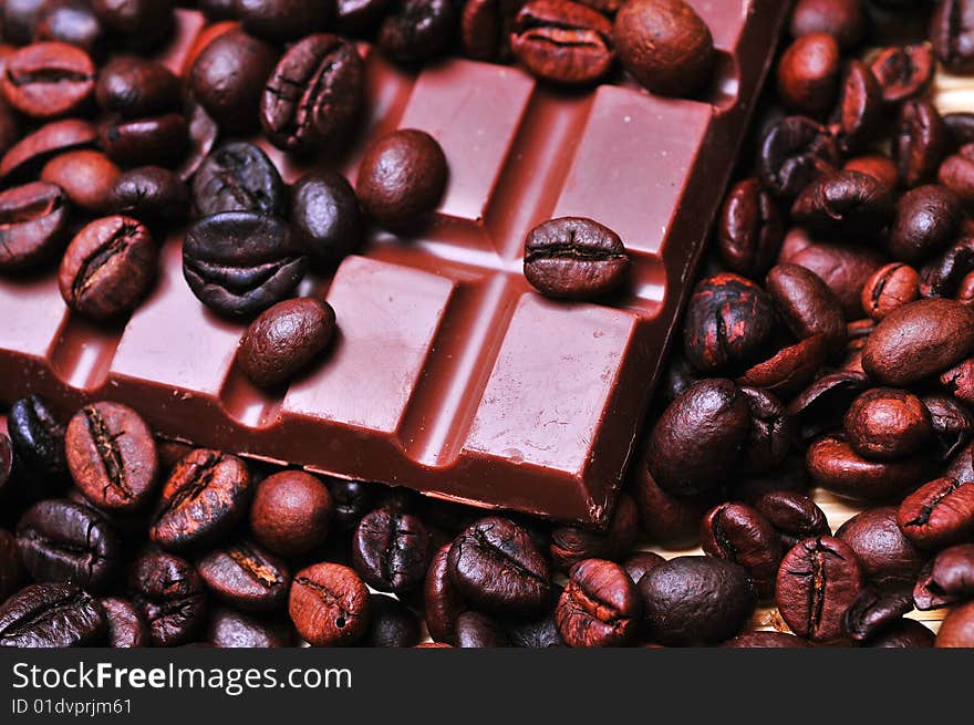 Close up of a coffee beans and chocolate. Close up of a coffee beans and chocolate