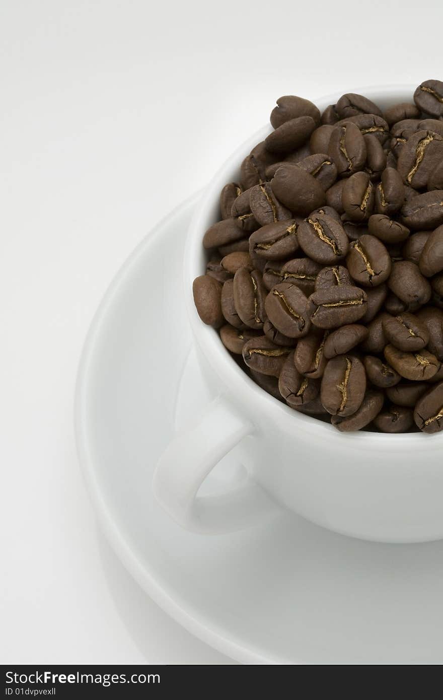 Crop image of coffee bean in ceramic cup. Crop image of coffee bean in ceramic cup