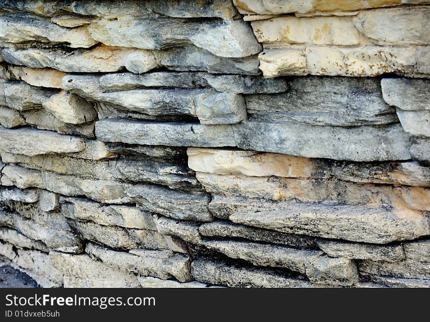 A stone wall in a park of Guangzhou, China.