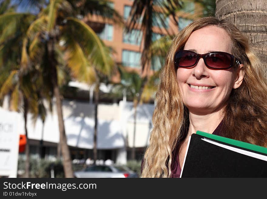 Woman smiling in sunglasses