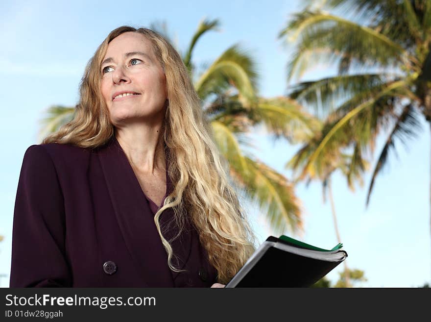 Woman On A Tropical Background