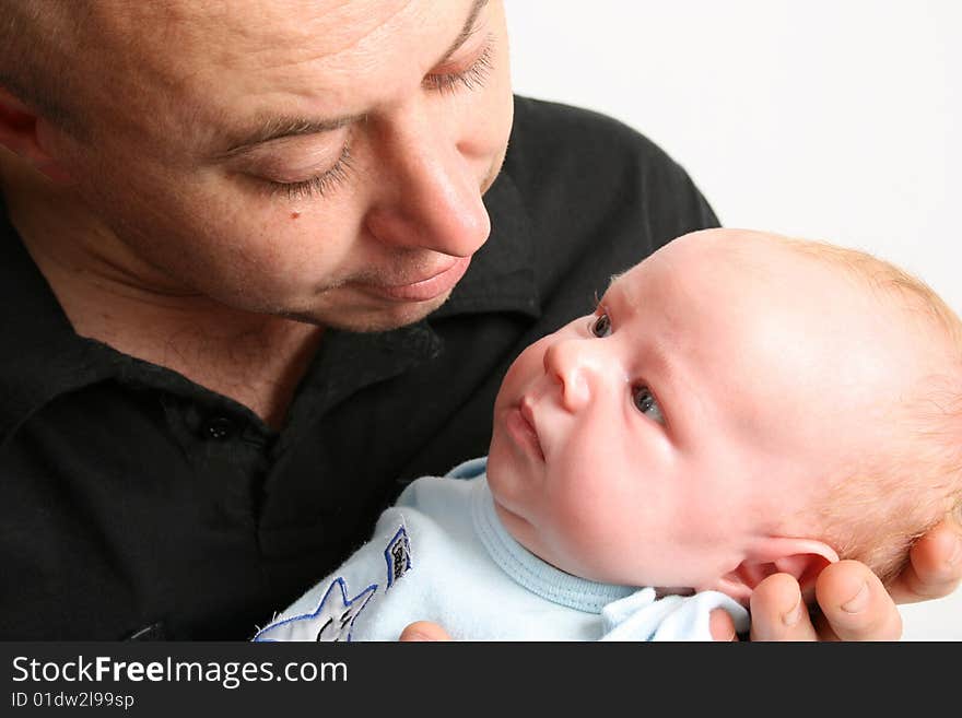 Father and Baby boy on a white background. Father and Baby boy on a white background