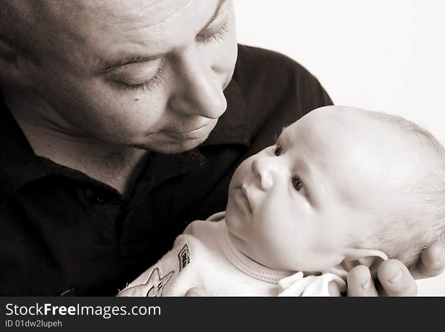 Father and Baby boy on a white background. Father and Baby boy on a white background