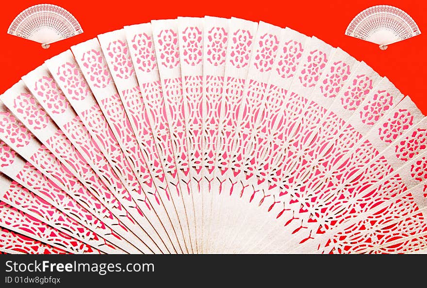 Folding Chinese bamboo fans opened up.

 The Chinese bamboo fan is traditional handicrafts in China, making is very exquisite