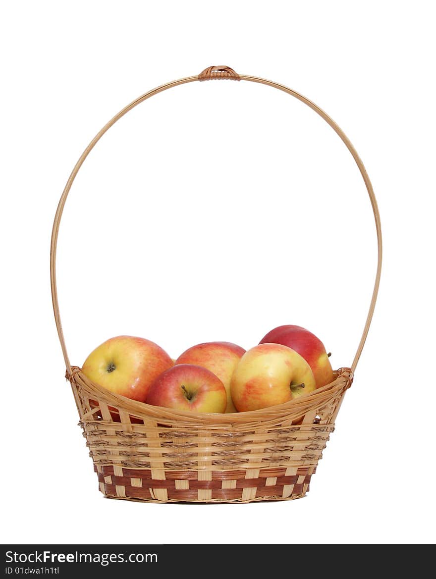 Basket wth apples isolated on a white background .