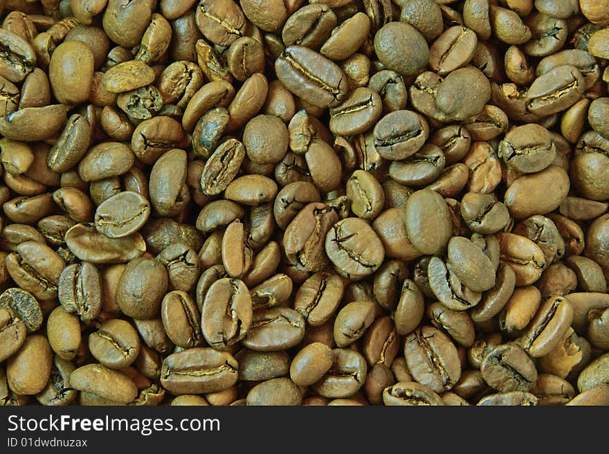 Background out of lightly roasted coffee beans