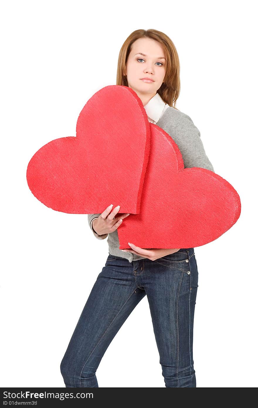 Model girl holding two hearts  over white