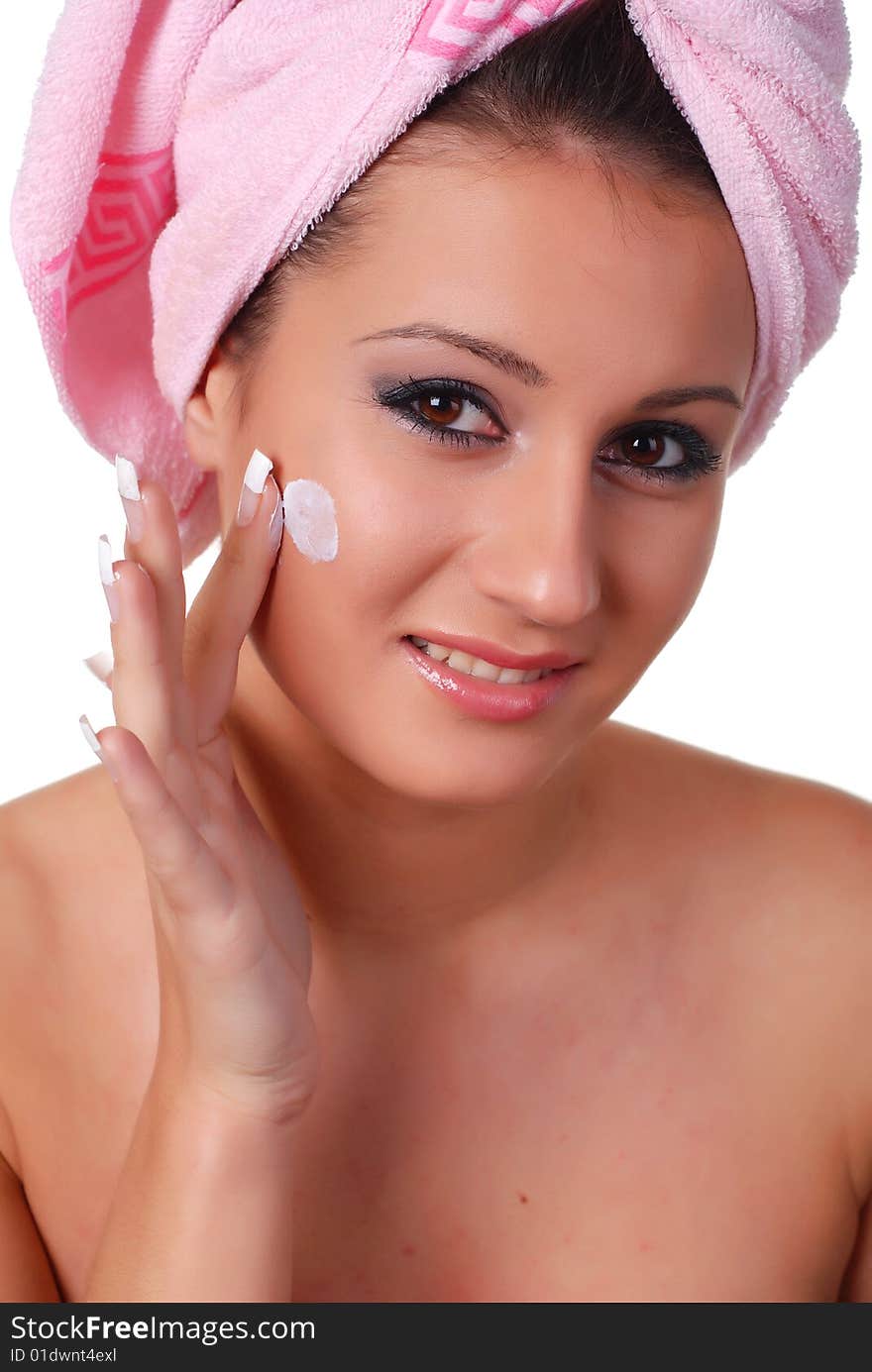 Portrait of woman in pink towel on her head. Portrait of woman in pink towel on her head