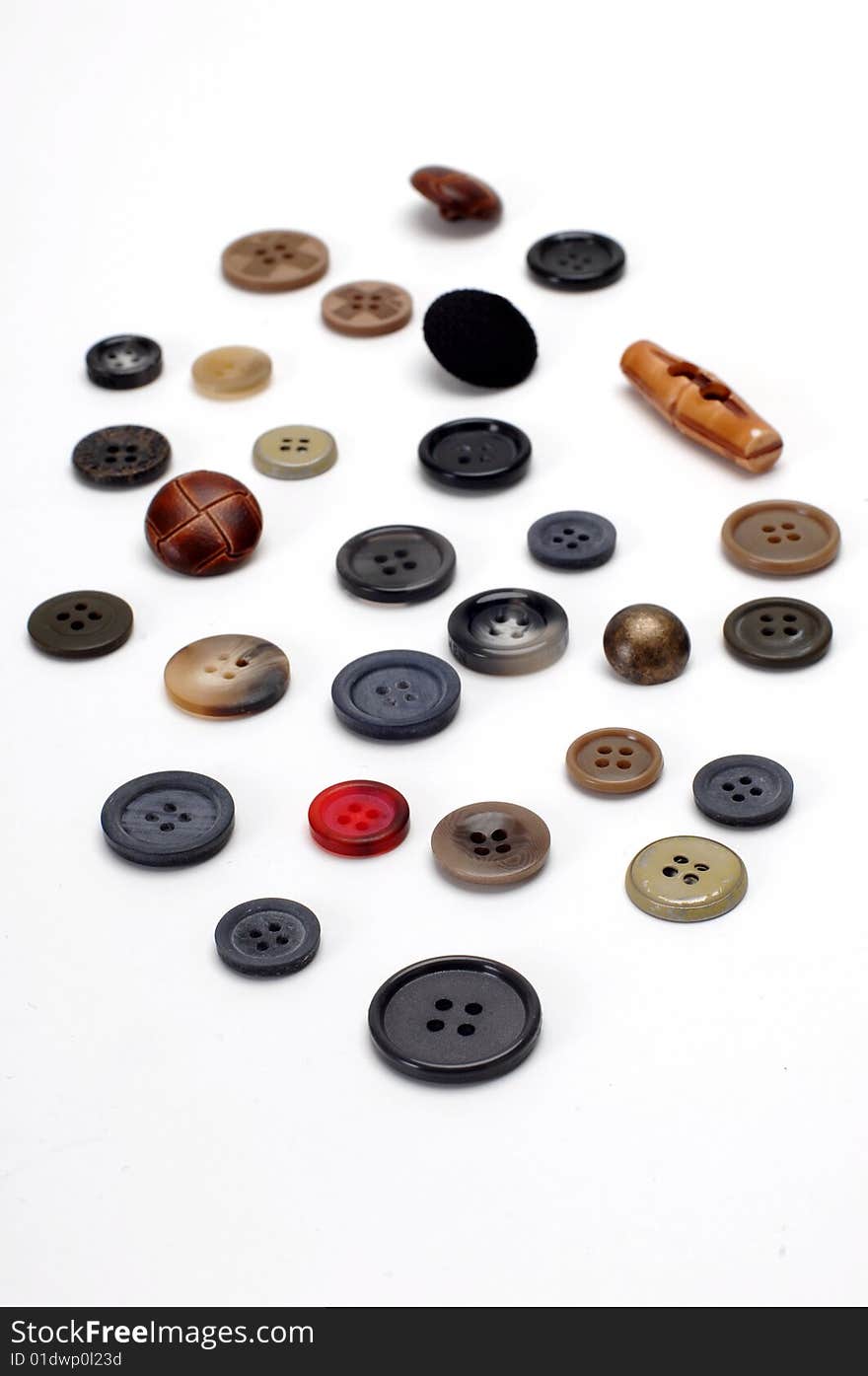 A few buttons isolated at white