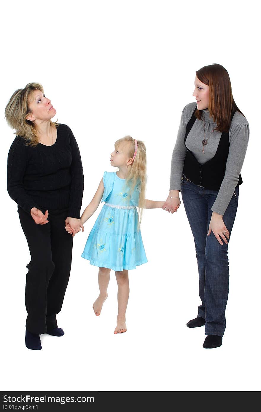 The woman, girl and child isolated on a white backgroun. The woman, girl and child isolated on a white backgroun