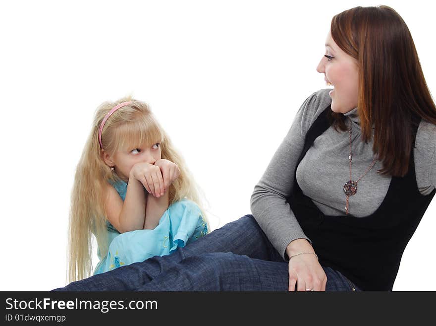 The young woman and  girl are isolated on a white background