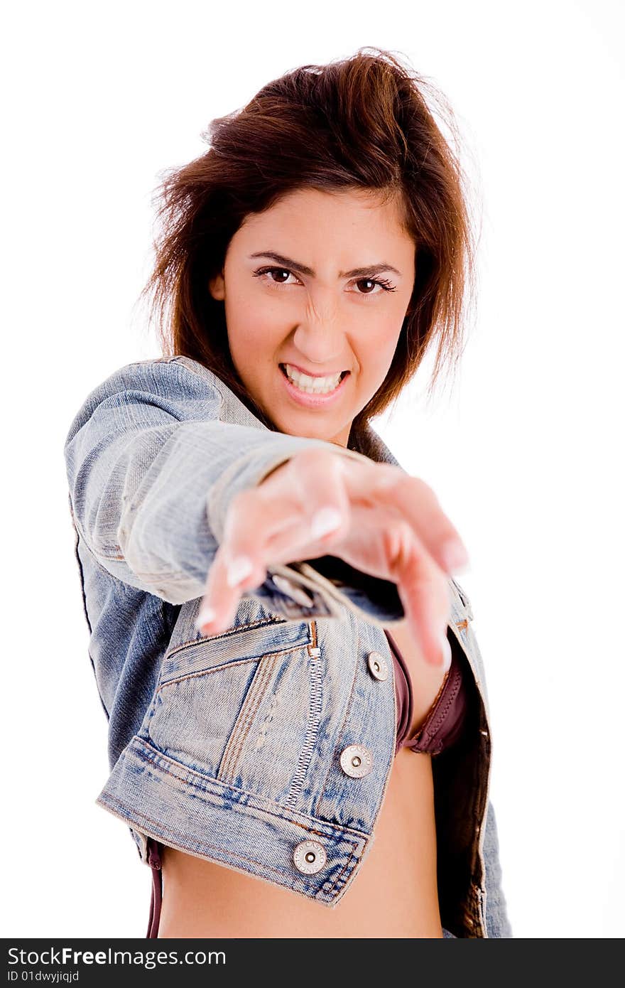 Portrait of young female showing hand gesture on an isolated background