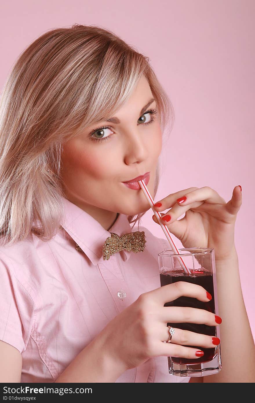 Attractive Young Woman Drinking Juice