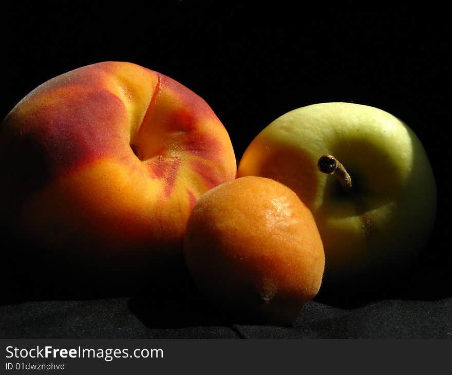 Fruits on the black background. Fruits on the black background