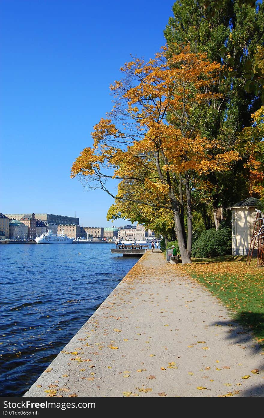 A part of the walk around Skeppsholmen in Stockholm, Sweden with a glance of the royal castle in the background. A part of the walk around Skeppsholmen in Stockholm, Sweden with a glance of the royal castle in the background.