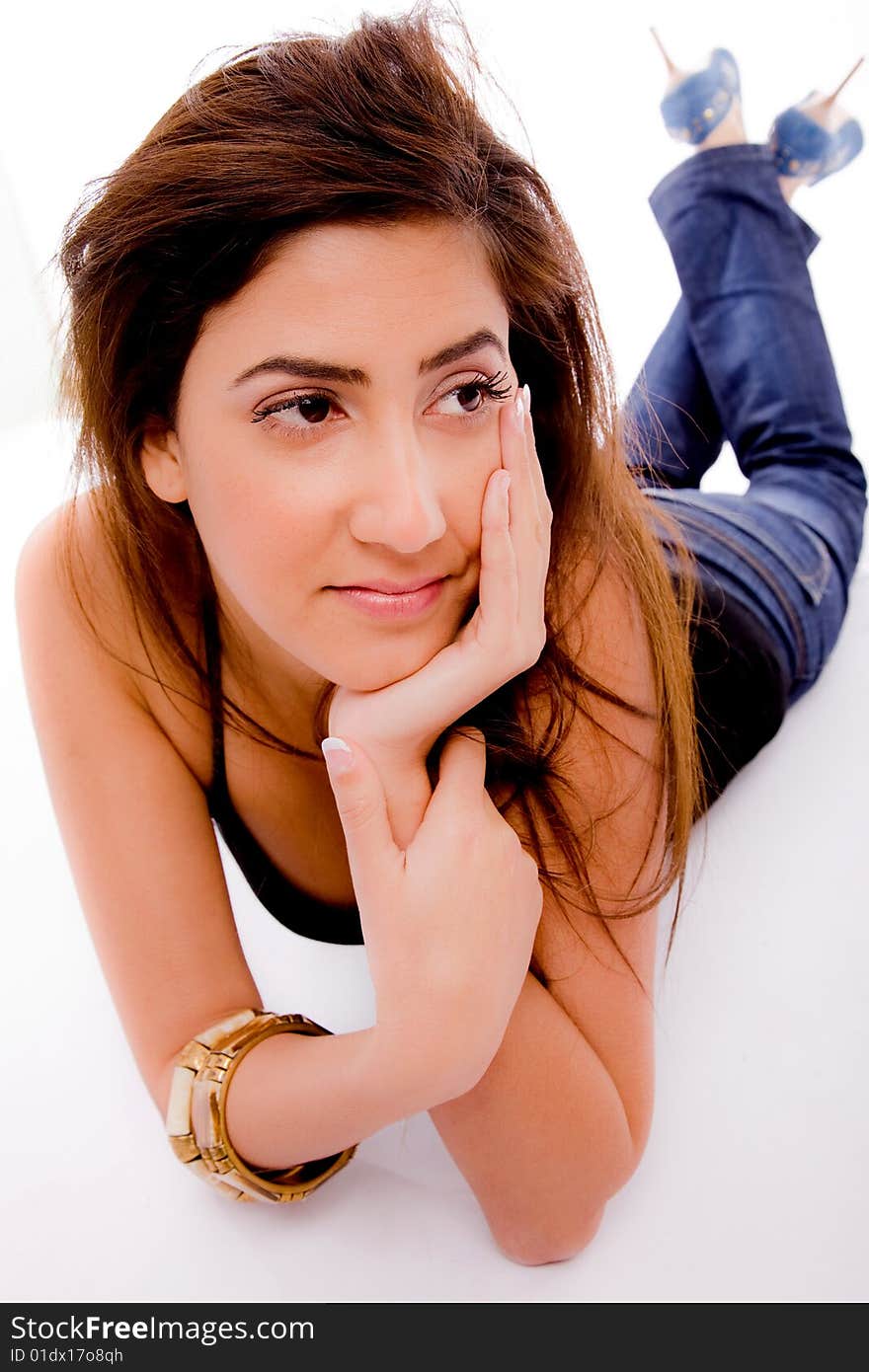 Front View Of Smiling Young Model Looking Aside