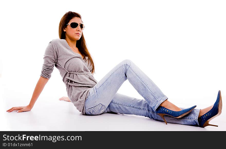 Young female with sunglasses looking aside