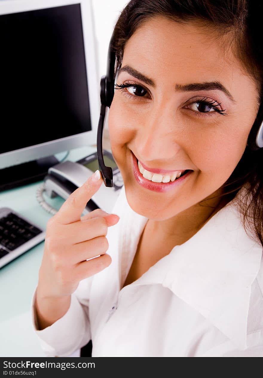 Side pose of smiling telecaller on an isolated white background. Side pose of smiling telecaller on an isolated white background