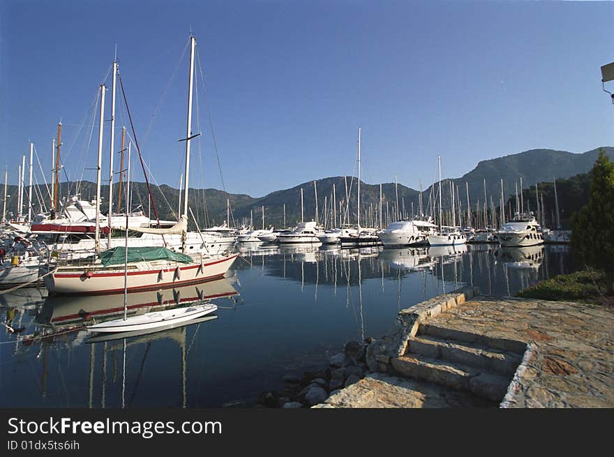 Sail yachts mooring in mediteranian yacht-club