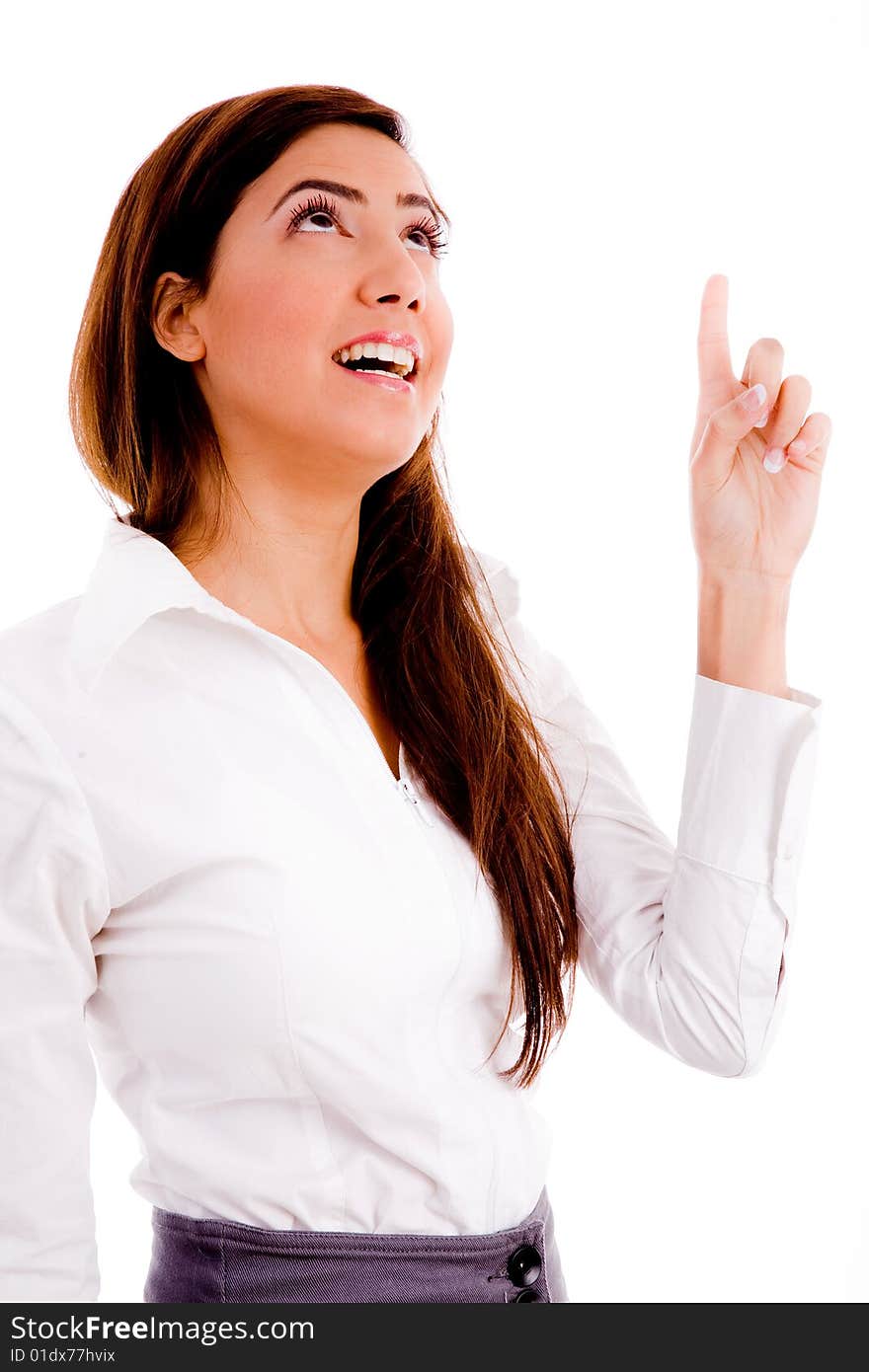 Portrait of businesswoman pointing up on an isolated white background