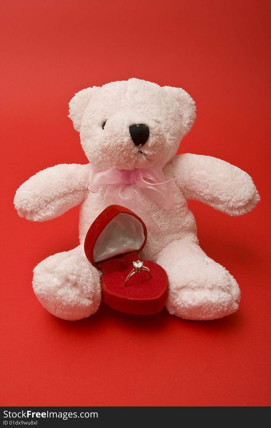 Valentine's Day symbols, teddy bear and ring