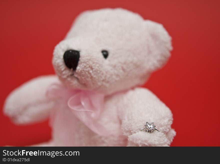 Valentine's Day symbols, teddy bear and ring