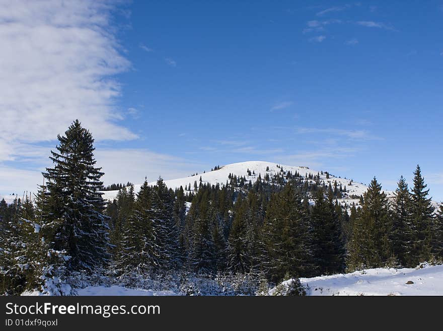 Winter landscape, mountains and trees