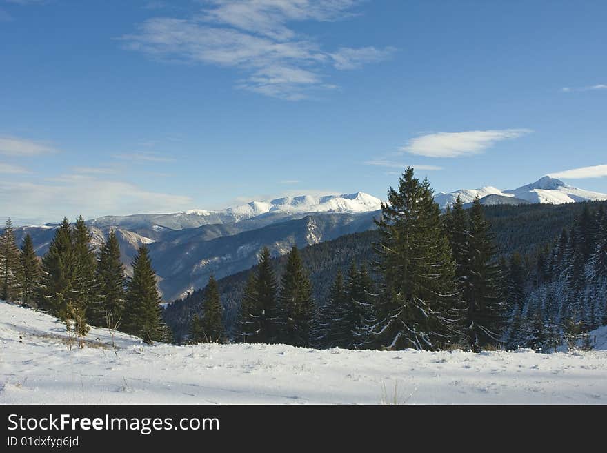 Winter landscape, mountains and trees