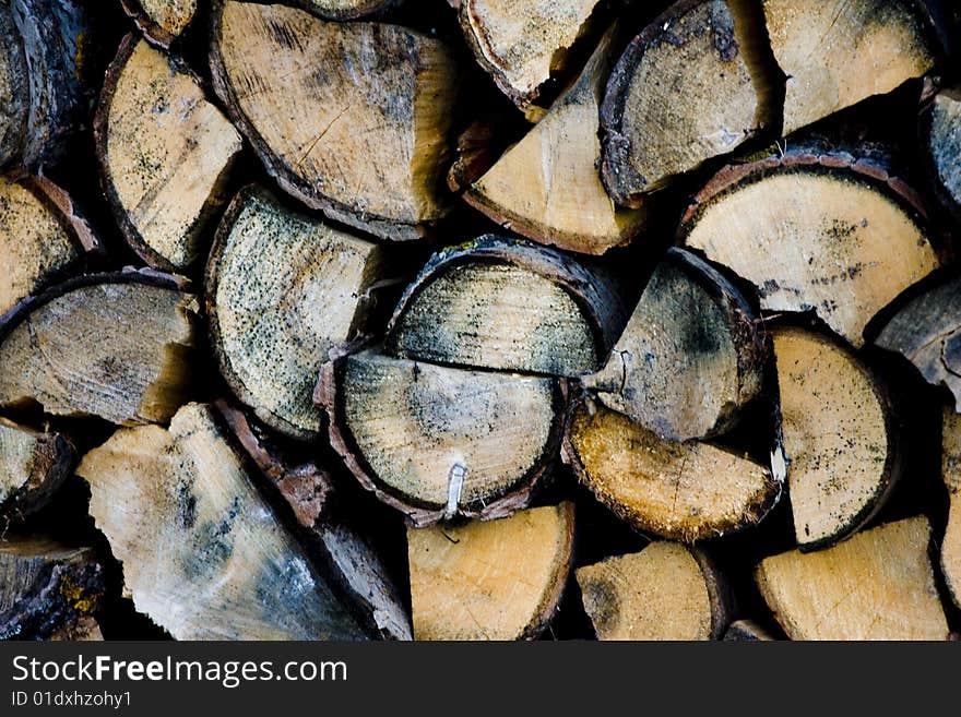 Pile of firewood, stacked for winter. Pile of firewood, stacked for winter