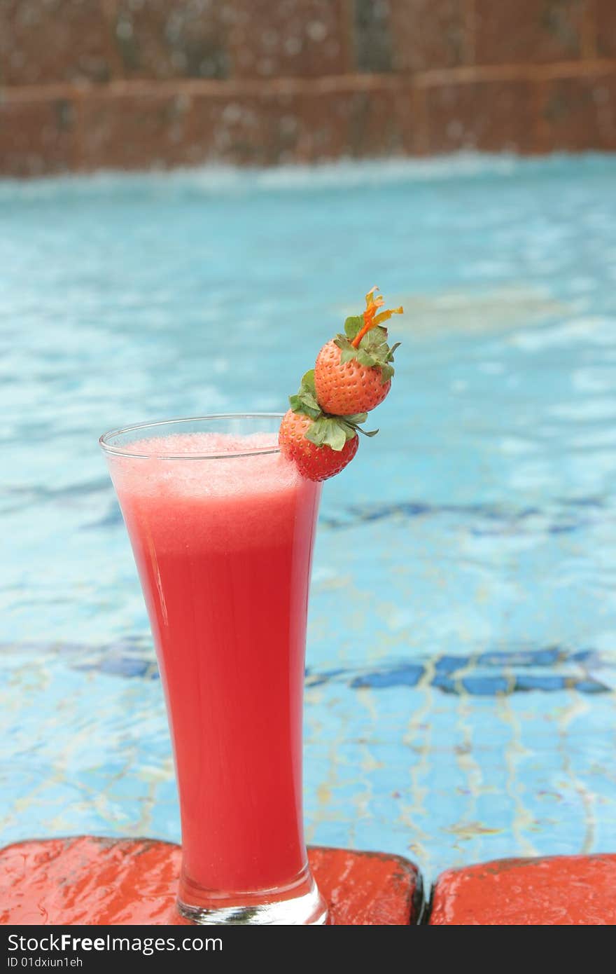 Fresh strawberry juice at pool