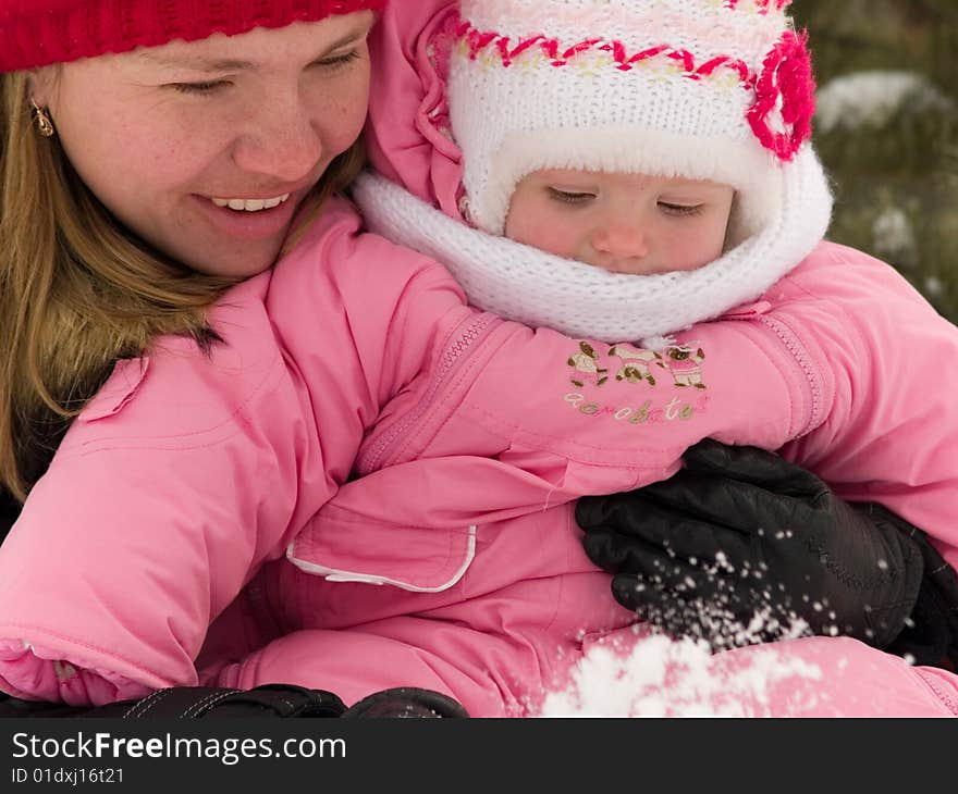 Mother and daughter at winter