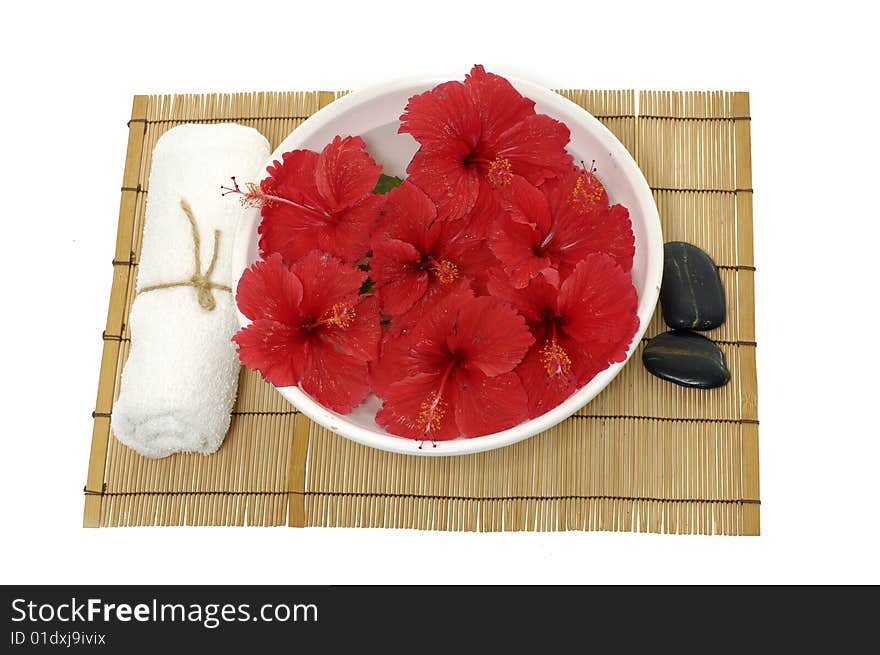 Red flowers in vase with stones. Red flowers in vase with stones